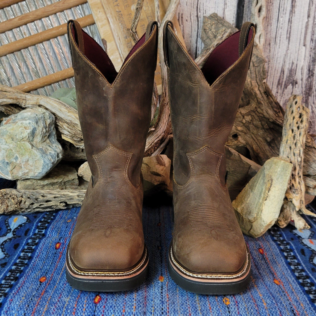 Brown leather boot with weathered finish.