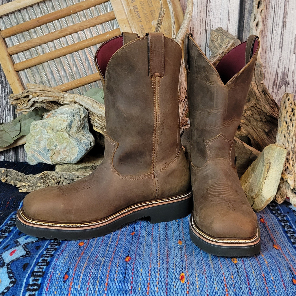 Brown leather boot with weathered finish.
