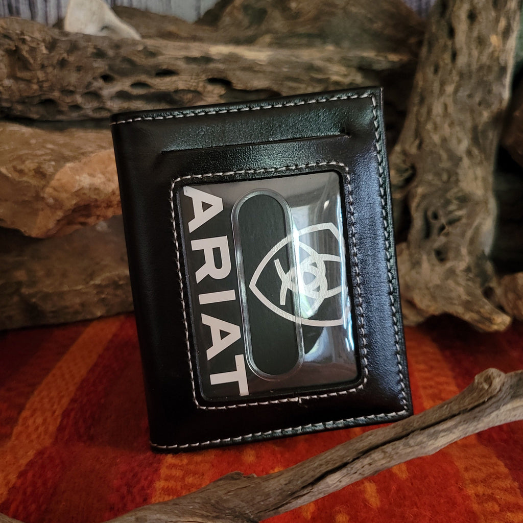 ID slot on the back of the wallet.