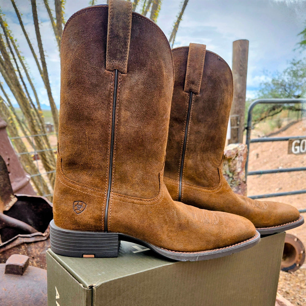 Tan leather boot with rubber outsole.