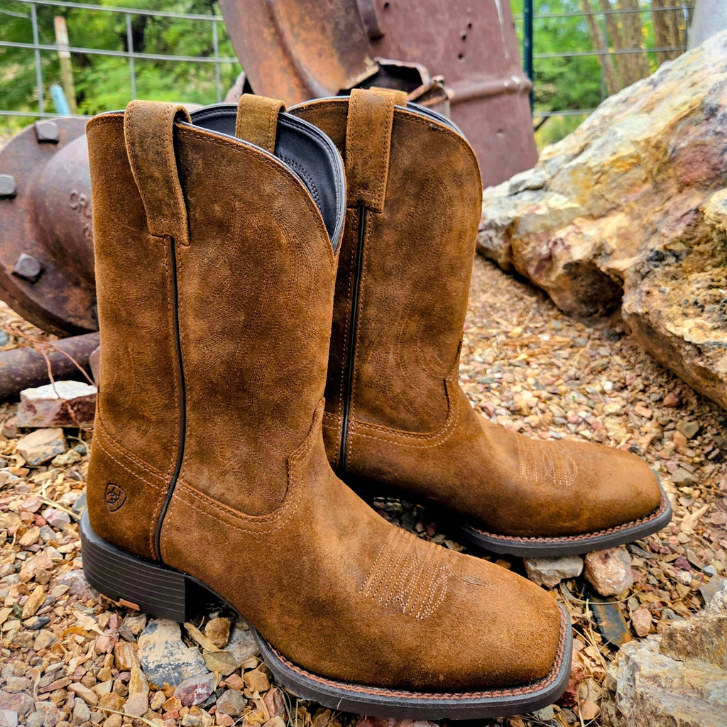 Tan leather boot with rubber outsole.