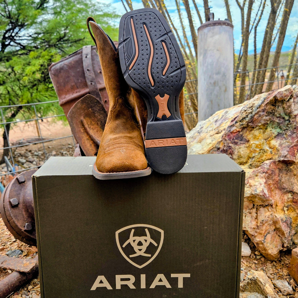 Tan leather boot with rubber outsole.