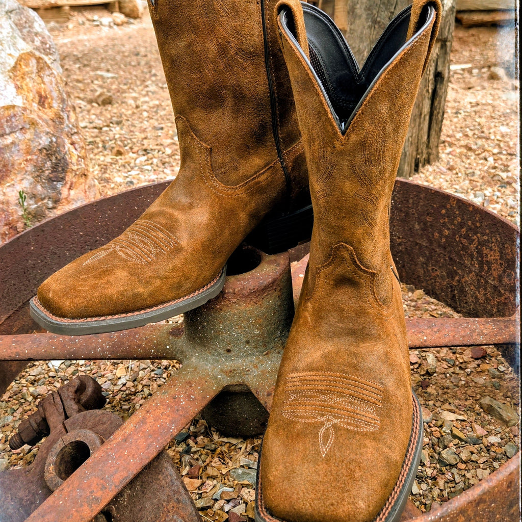 Close-up of the square toe and stitching on the boot.
