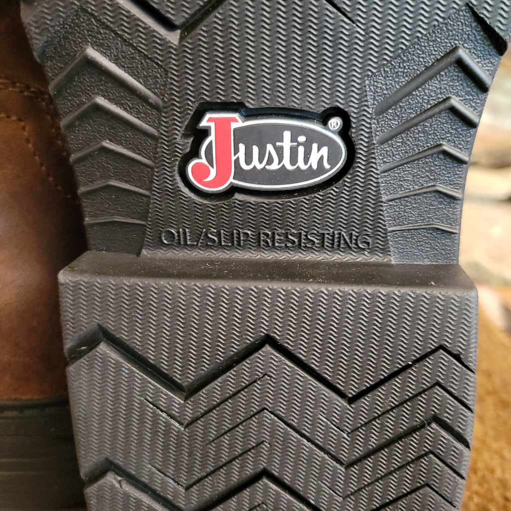 A close-up of the brand's logo on the rubber outsole.