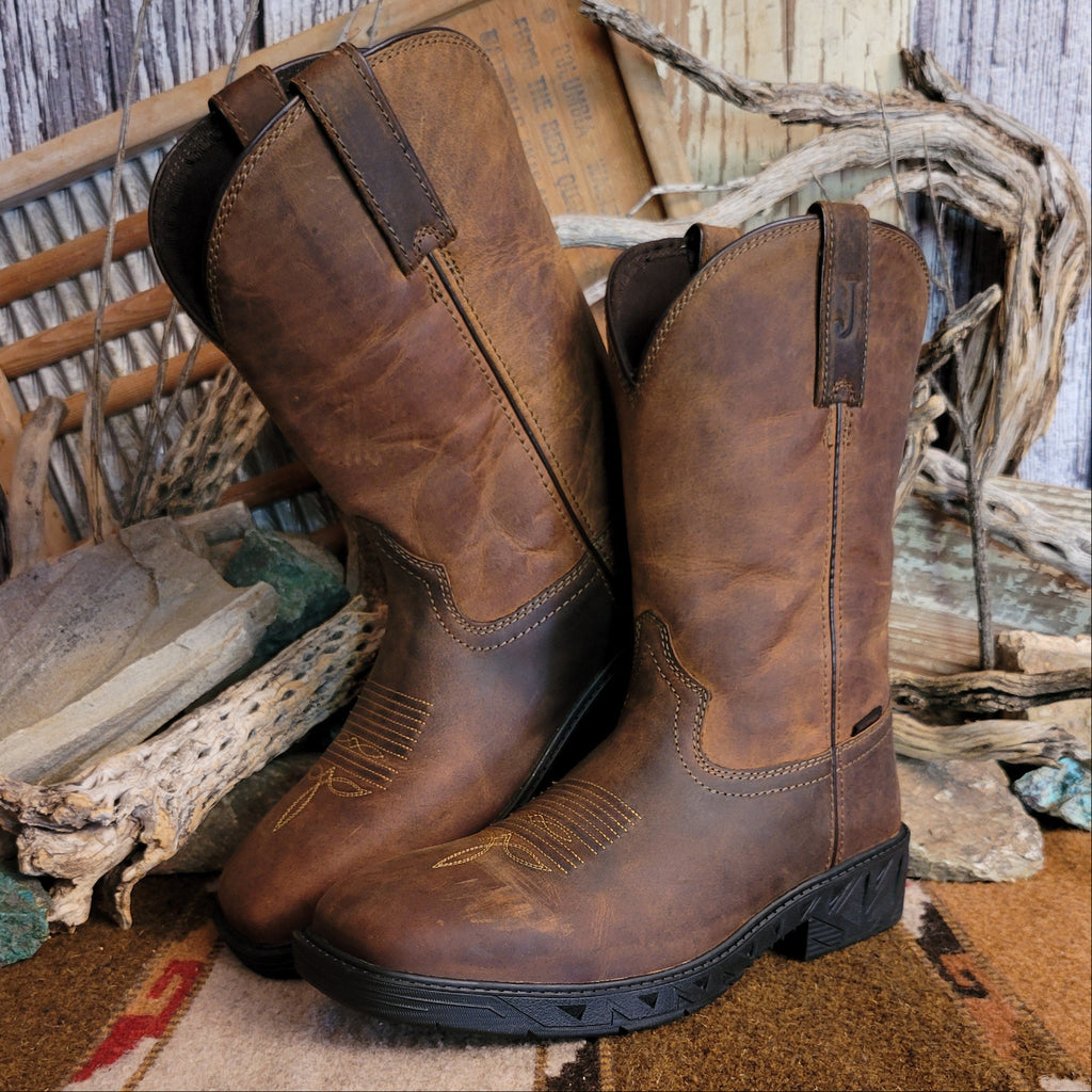 Brown leather boot with weathered appearance and cowboy stitching on the toe.