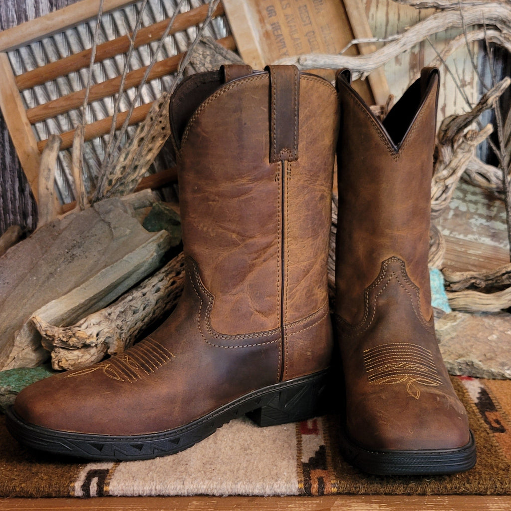 Brown leather boot with weathered appearance and cowboy stitching on the toe.