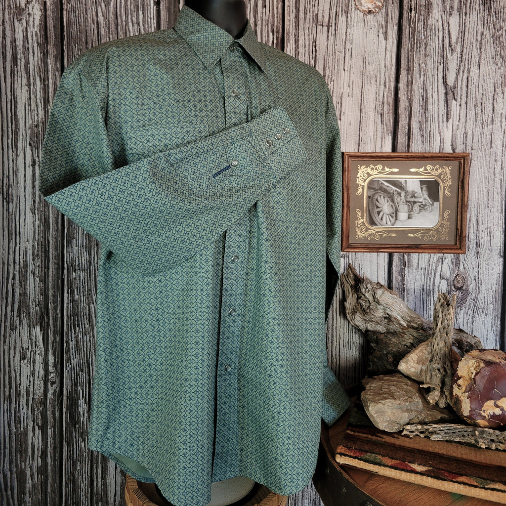 Moss colored shirt with small intricate patterns and pearl snap buttons.
