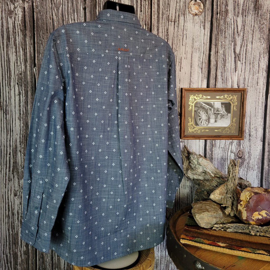 Denim long sleeve shirt with white diamond patterns and buttons.