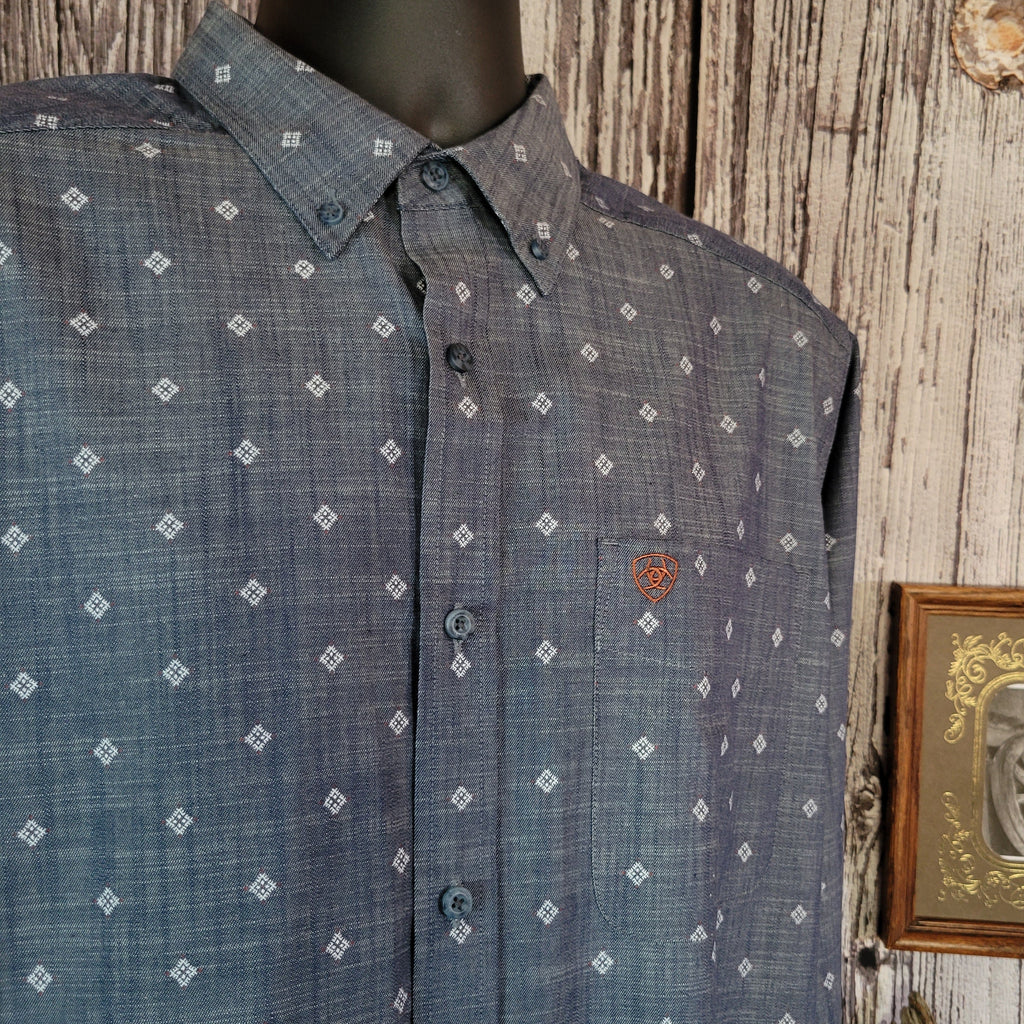 Denim long sleeve shirt with white diamond patterns and buttons.