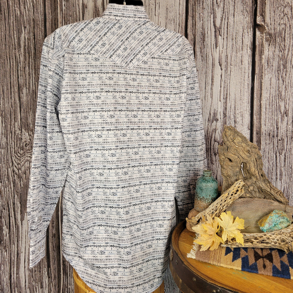The back features patterned white snap button shirt with black and blue accents.