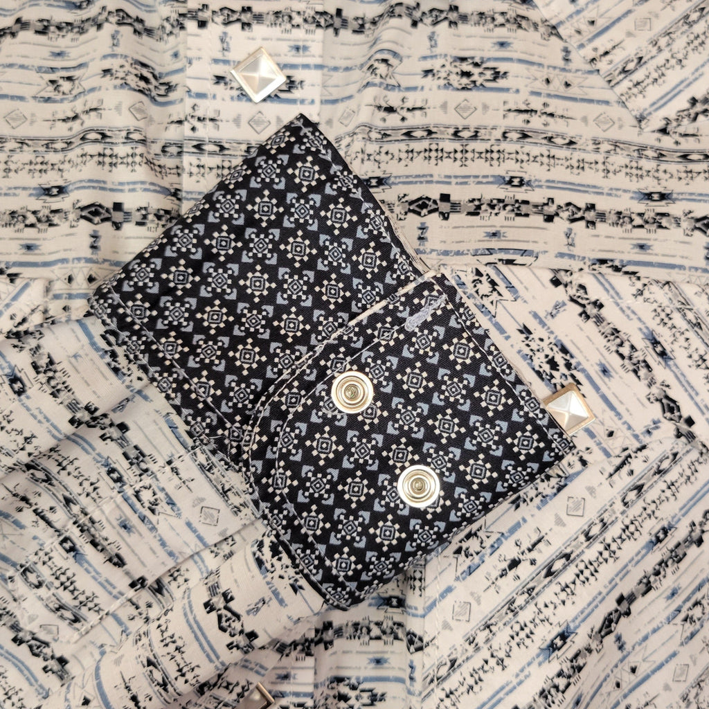 The inside of the sleeve is black with intricate blue and white patterns.