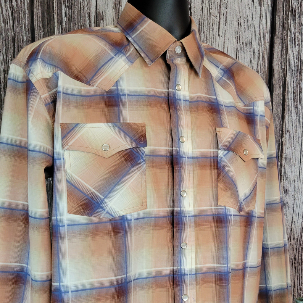 A close up of the snap button down of the shirt.