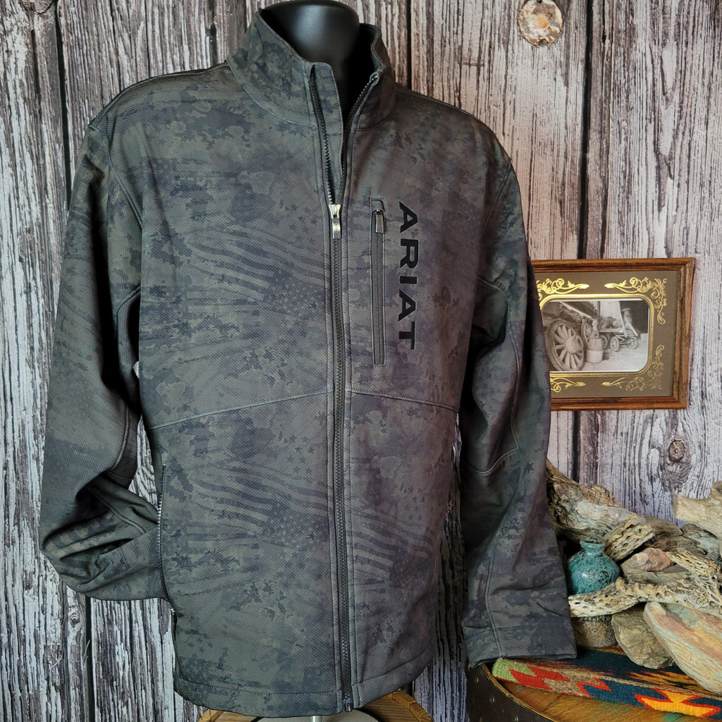 Forest green softshell jacket with patriotic motifs and concealed carry pocket on the interior.