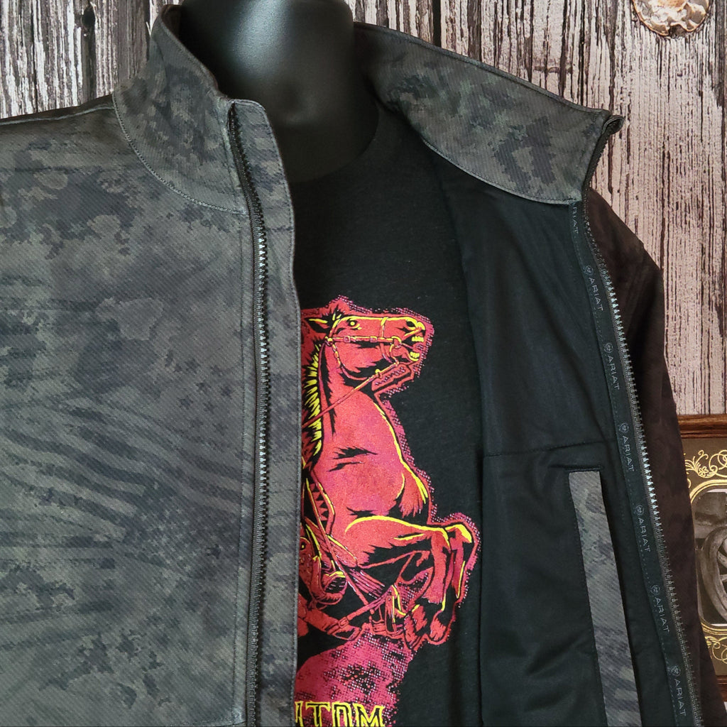 Forest green softshell jacket with patriotic motifs and concealed carry pocket on the interior.