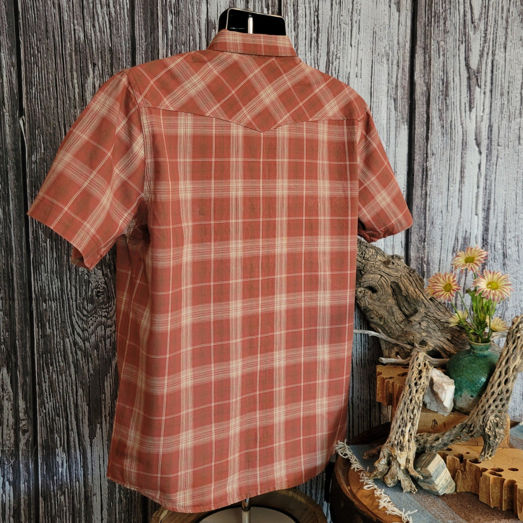 Rust-colored plaid shirt with short sleeves.