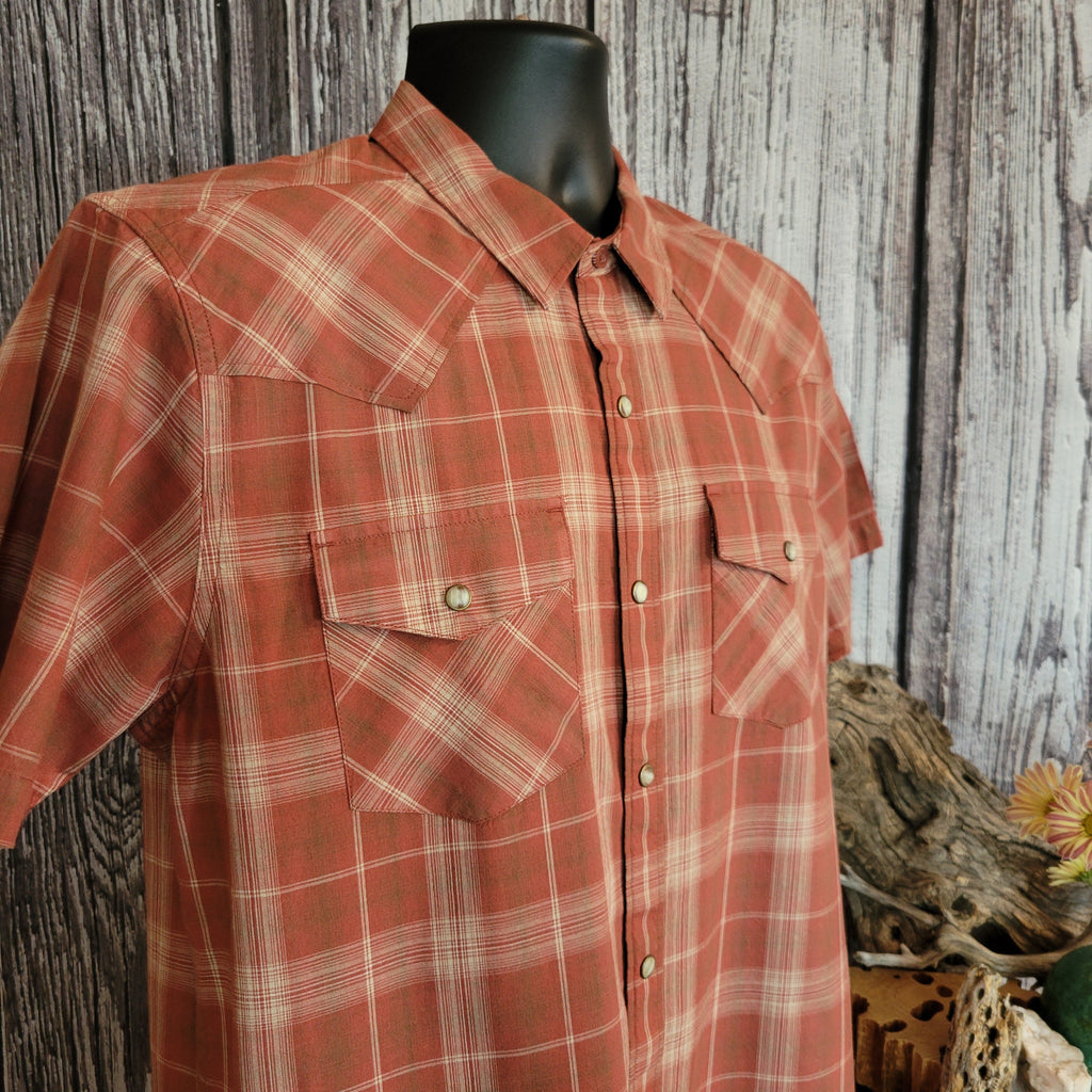 Plaid shirt with short sleeves, featuring snap buttons and two chest pockets.