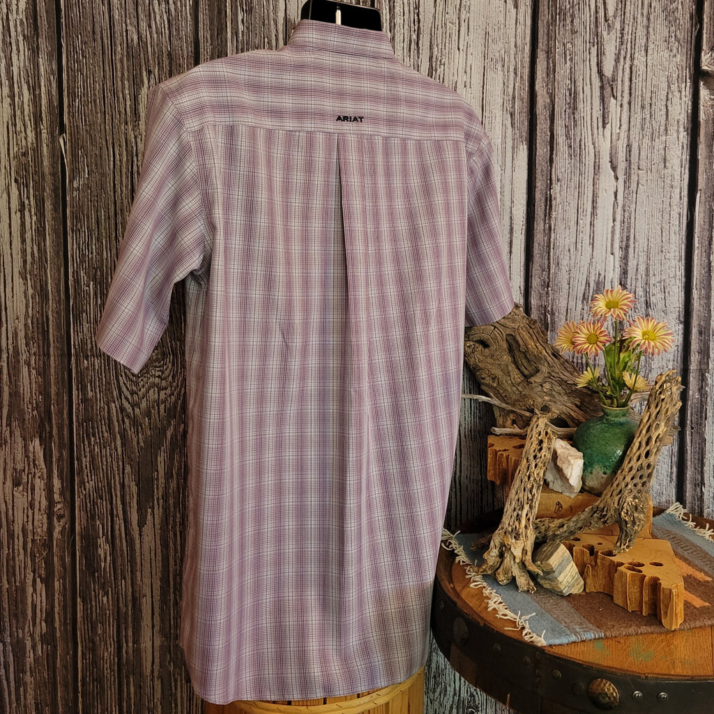 Purple plaid striped shirt continues the pattern on the back.
