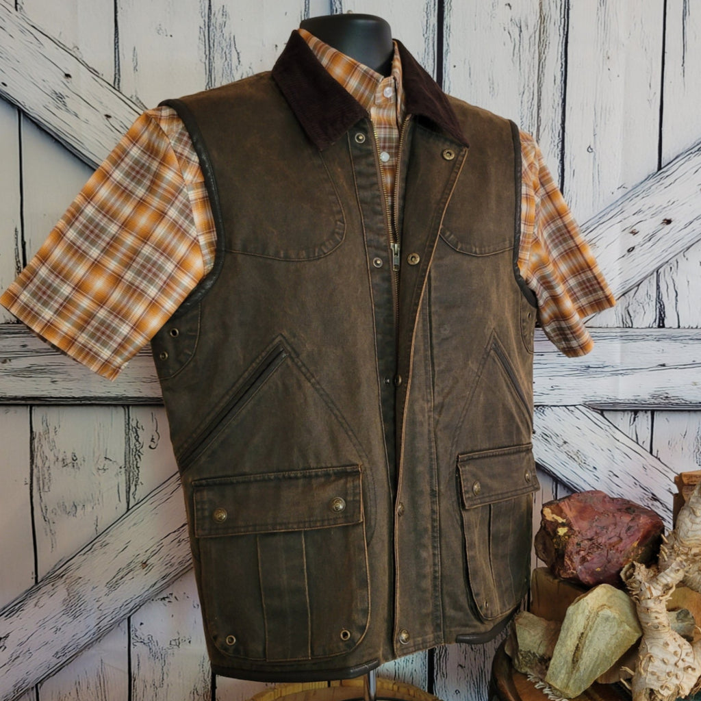 Brown ranch vest with corduroy collar and snap closures.