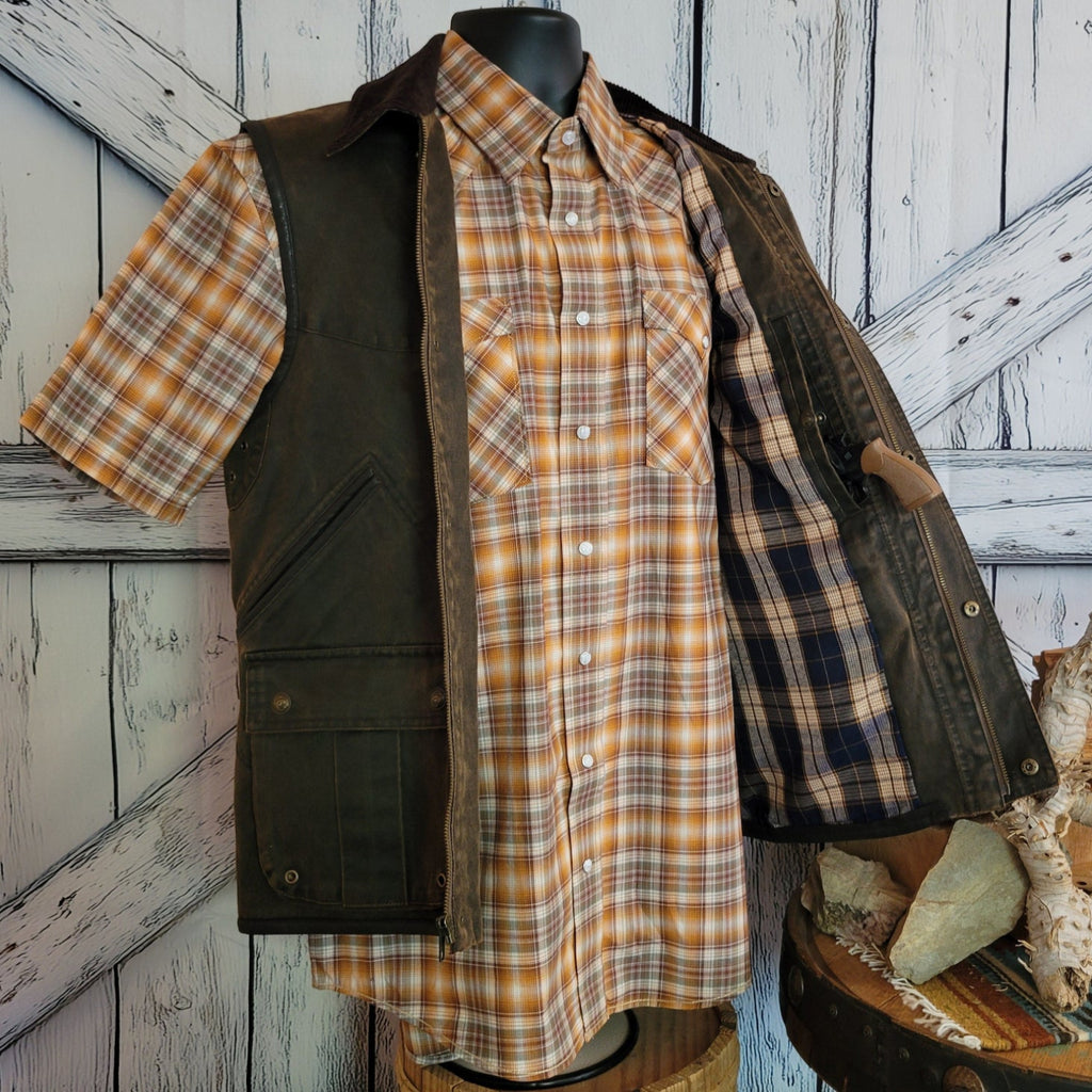 Brown ranch vest with corduroy collar and snap closures, plaid lining inside.