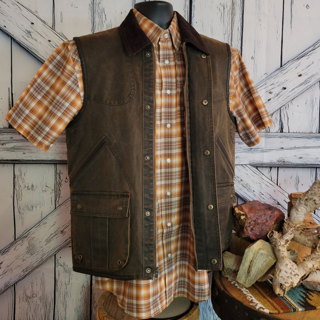 Brown ranch vest with corduroy collar and snap closures.