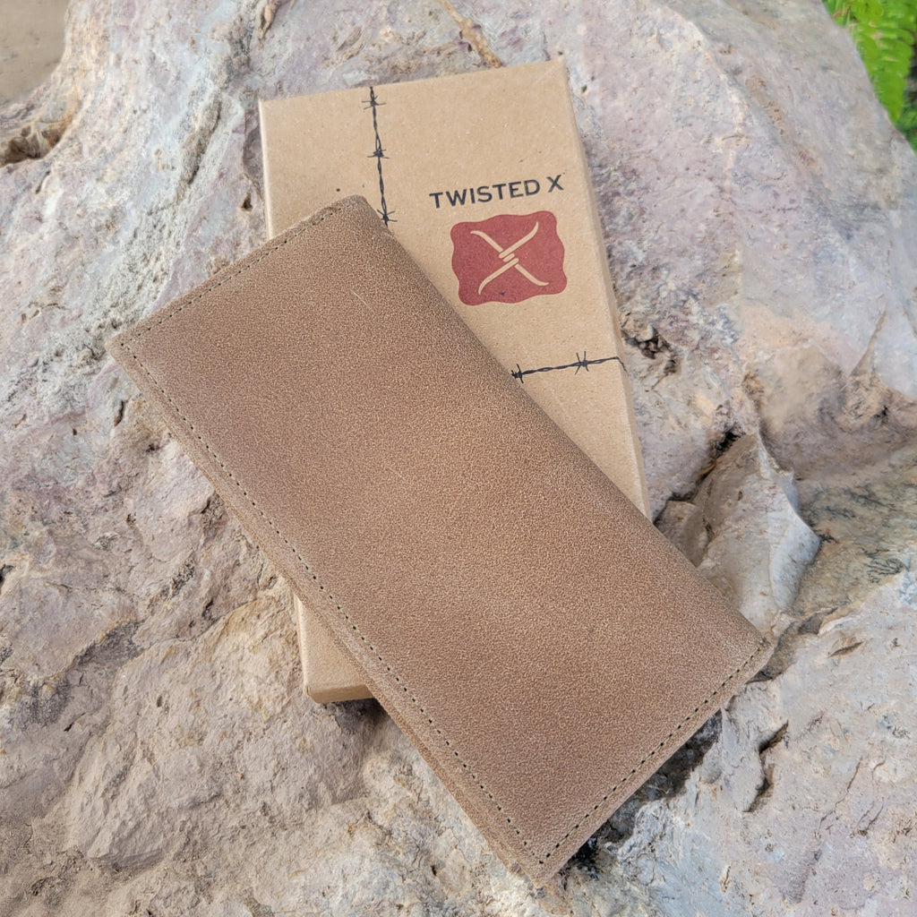 Tan suede leather wallet with minimal stitching.