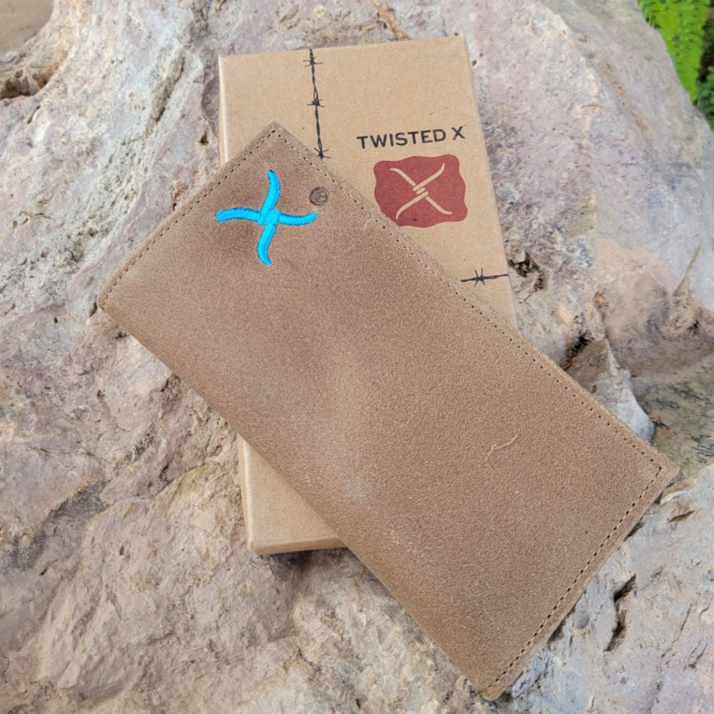 Tan suede leather wallet with embroidered turquoise logo on the front.