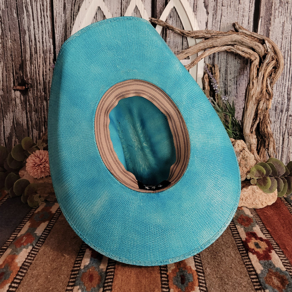 The interior of the blue hat features a tan sweatband.
