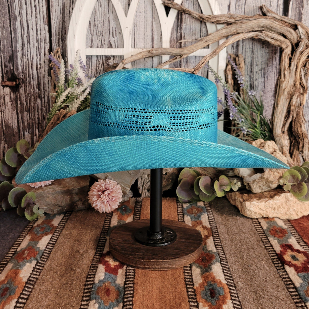 Blue hat with a multi-tone band.