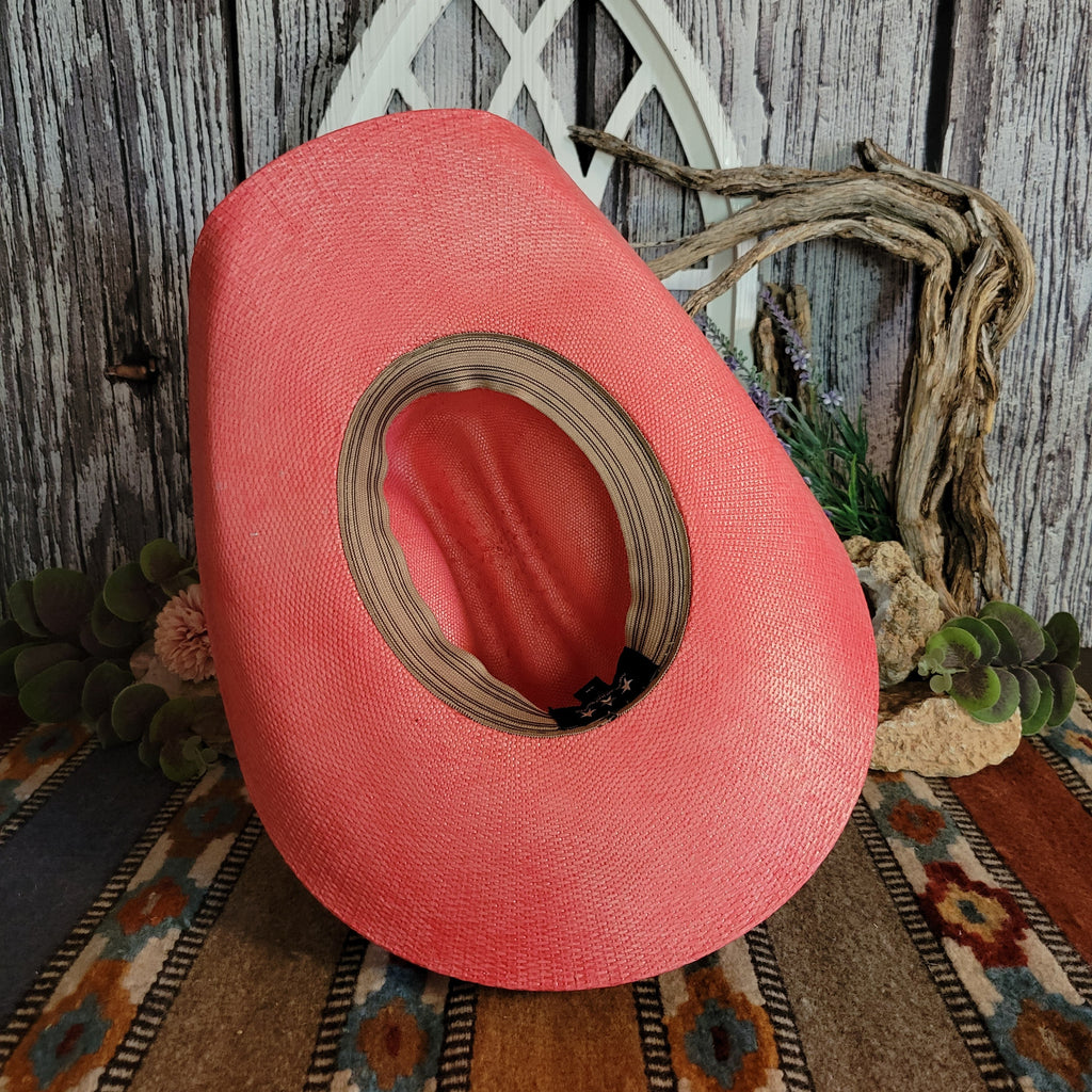The interior of the coral hat features a tan sweatband.