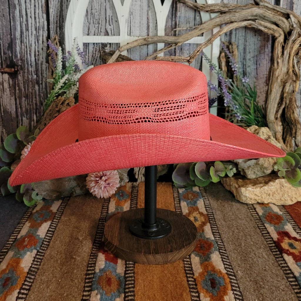 Coral hat with a multi-tone band.