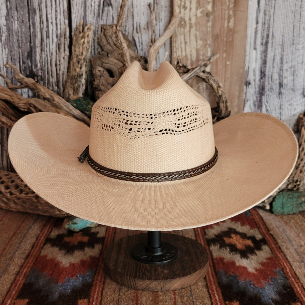 Straw hat with a multi-tone brown hat band.