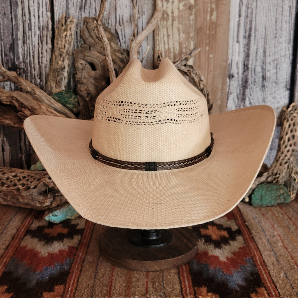 Straw hat with a multi-tone brown hat band.
