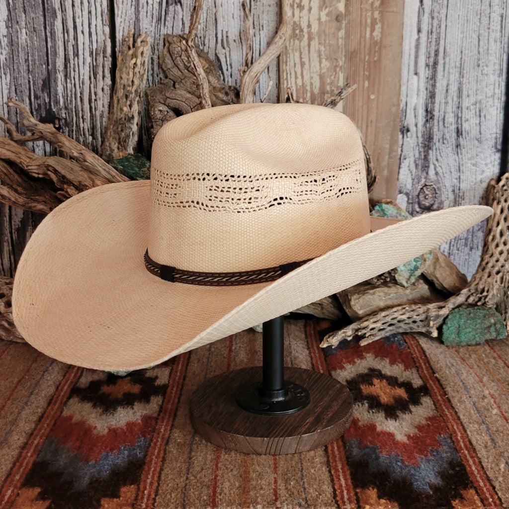 Straw hat with a multi-tone brown hat band.