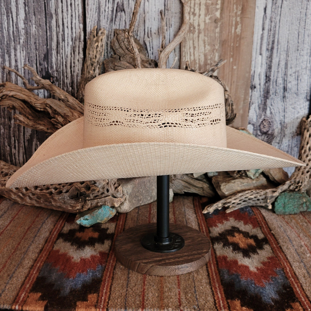 Straw hat with a multi-tone brown hat band.