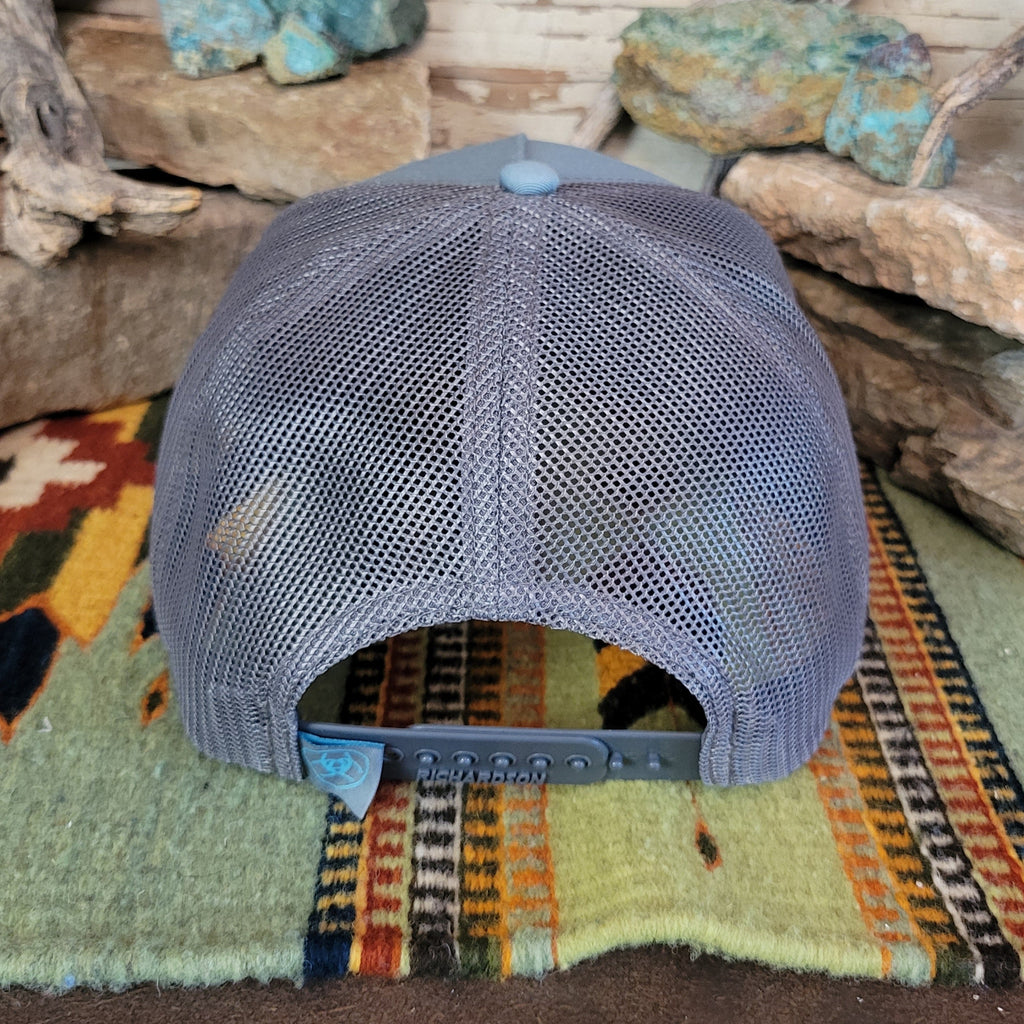 The back of the cap shows the mesh paneling and snap-back closure.