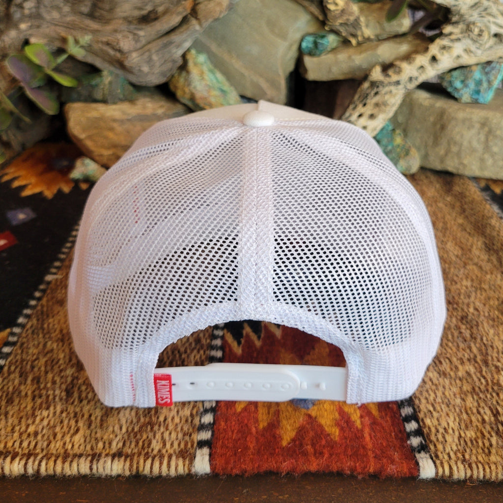 A white trucker cap with mesh paneling and snap-back closure.