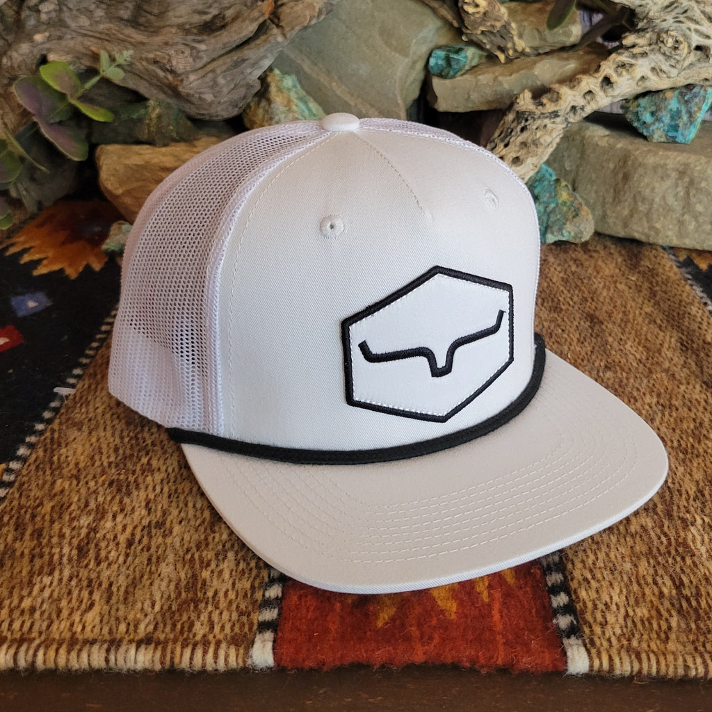 A white trucker cap with mesh paneling, featuring a black logo.
