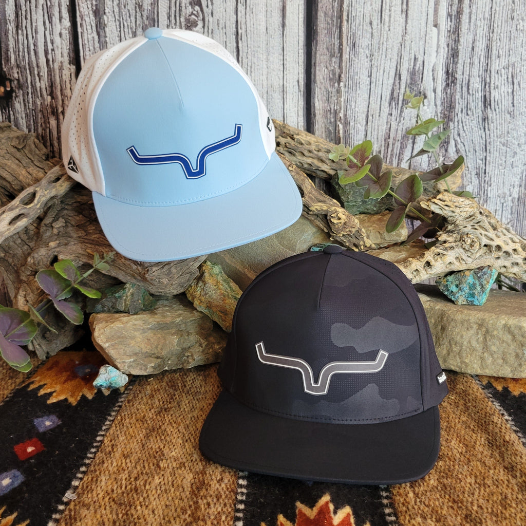 Two caps in the colors of light blue with white and black camo.