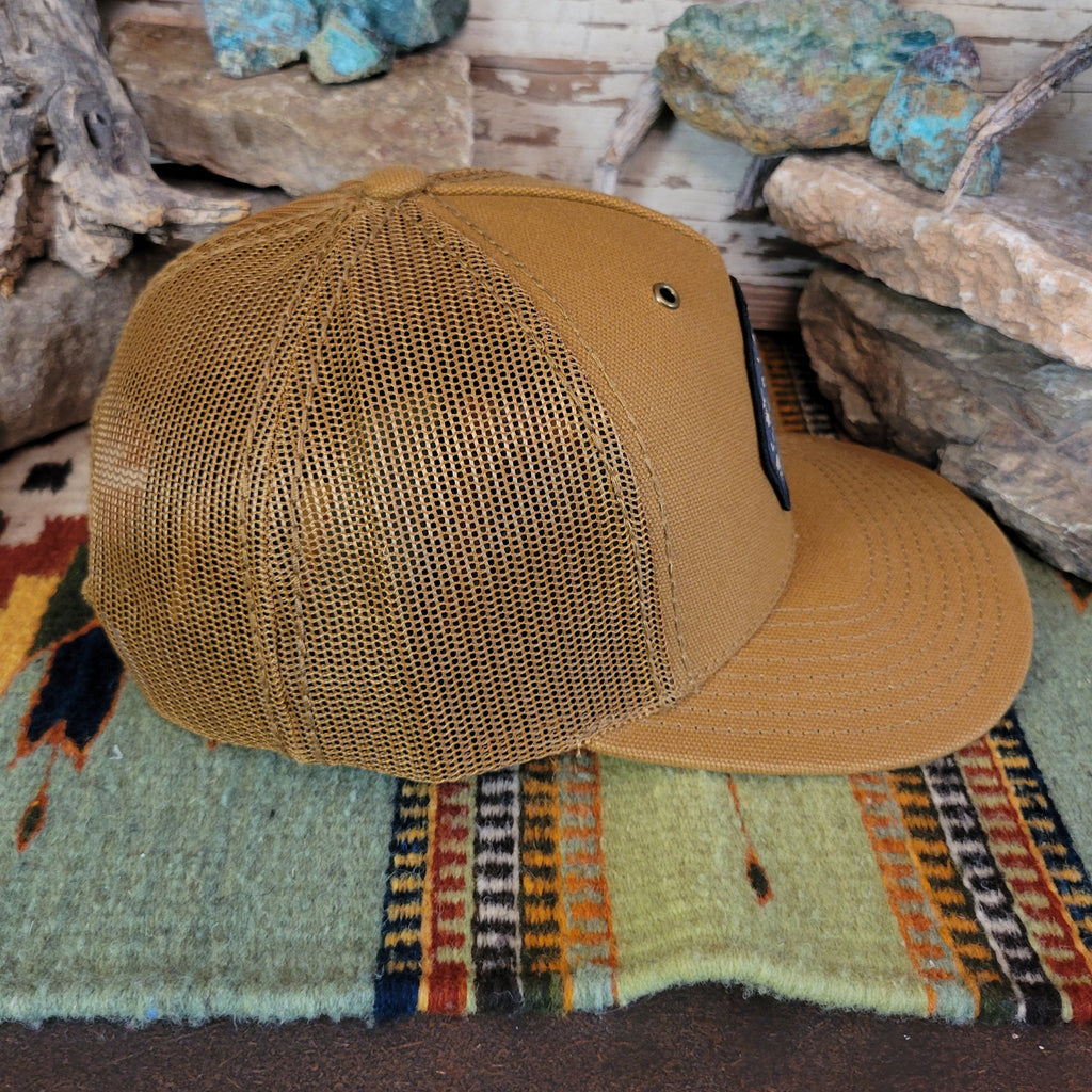 The side of the hat showcases the mesh paneling.