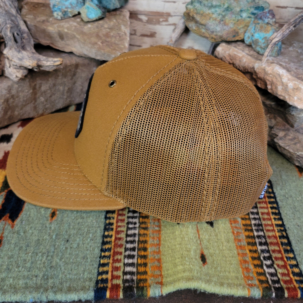 The side of the hat showcases the mesh paneling.