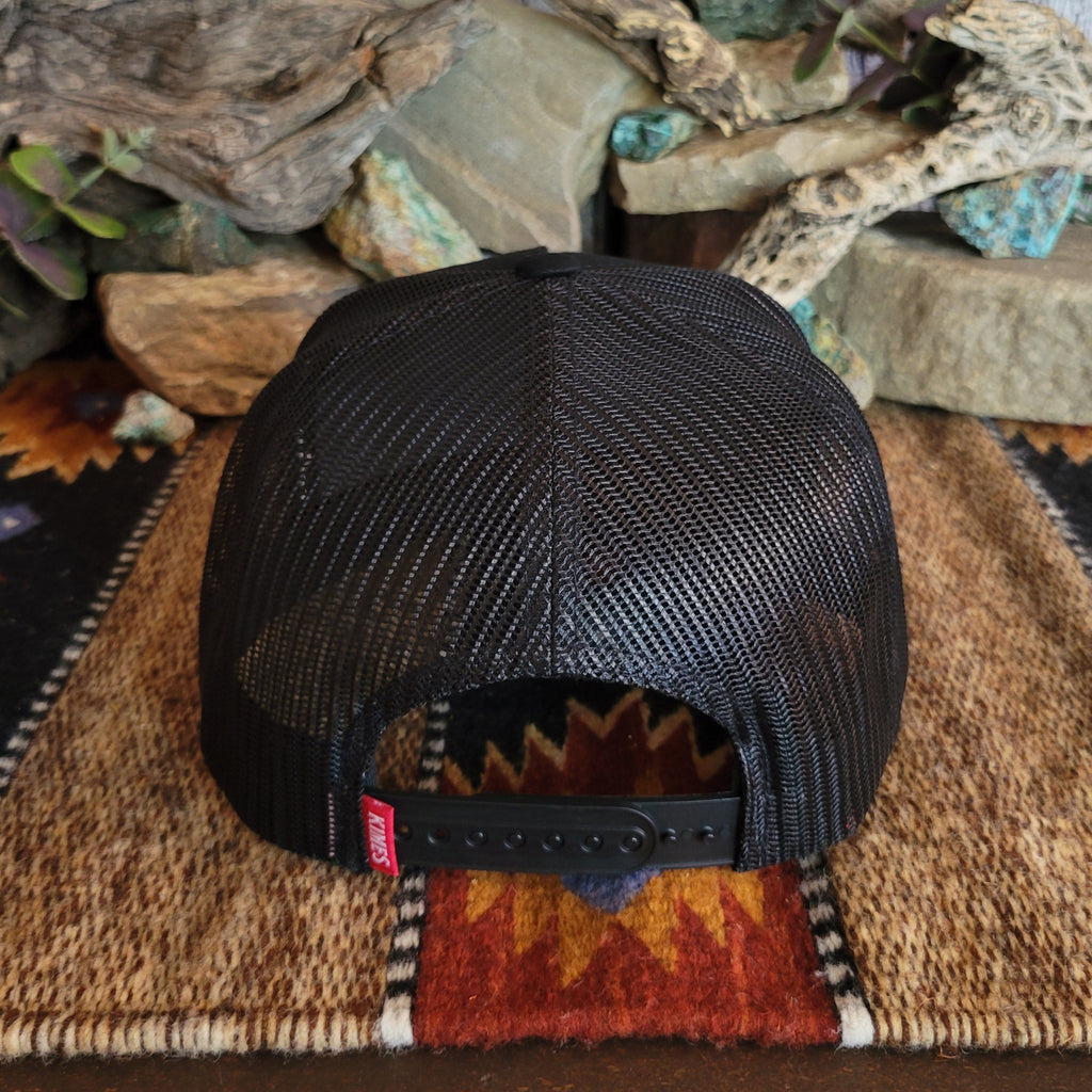 The back of the cap features a black snap-back closure and mesh paneling.