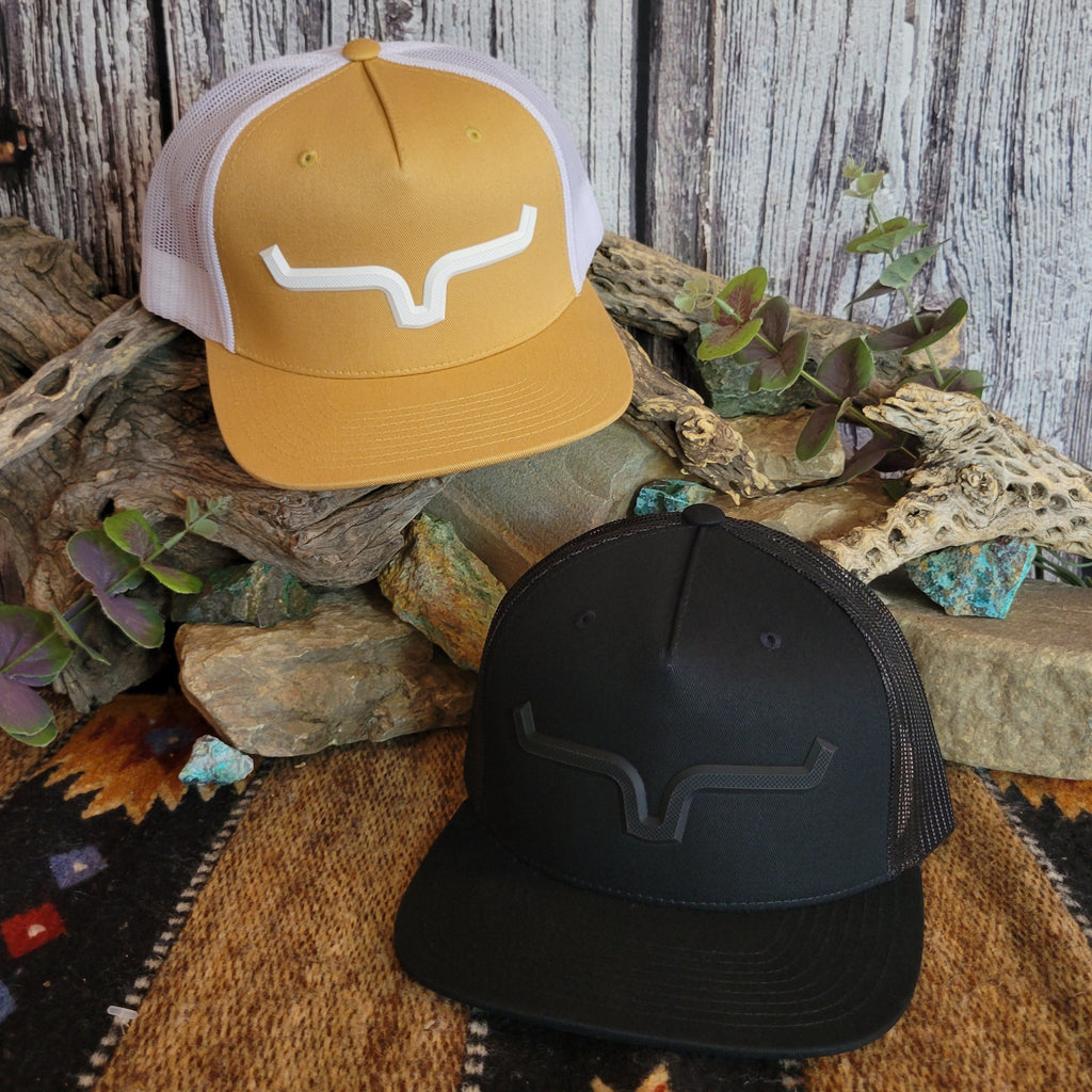 Two hats, one yellow and white, one black.
