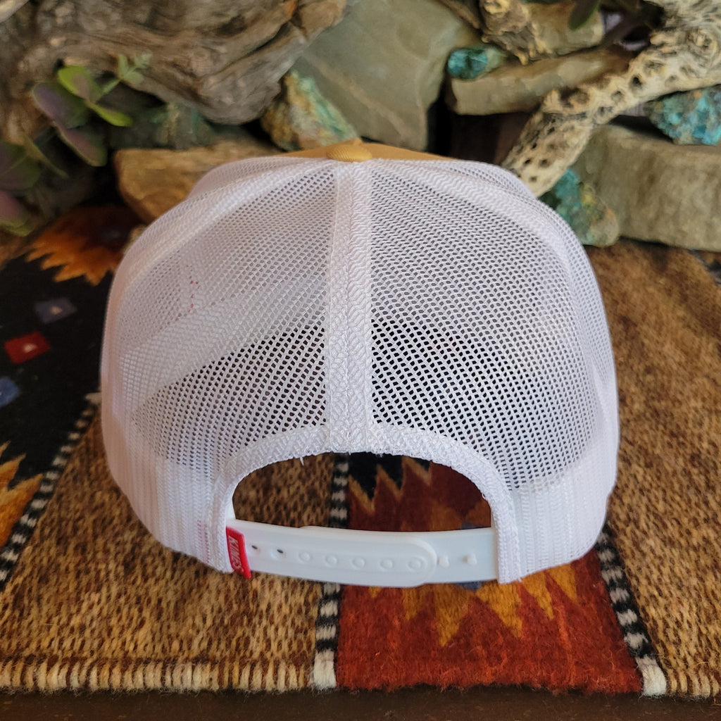 The back of the cap features a snap-back closure and white mesh paneling.