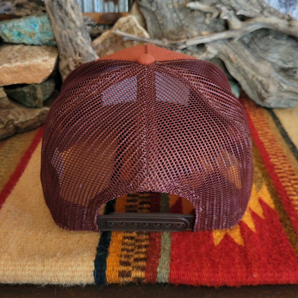 Back shows the maroon mesh paneling with adjustable snap closure.