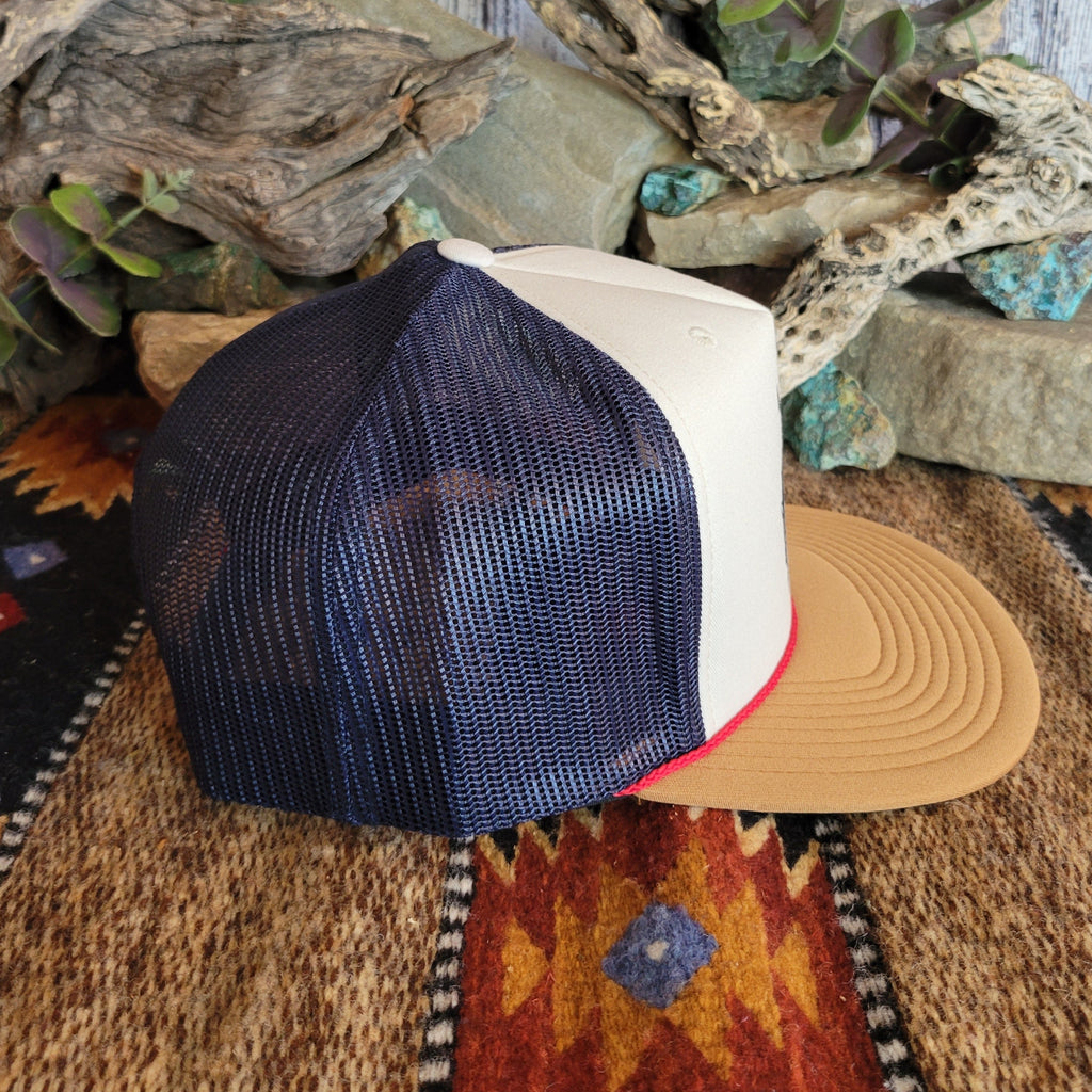 Navy mesh paneling on the side of the cap.