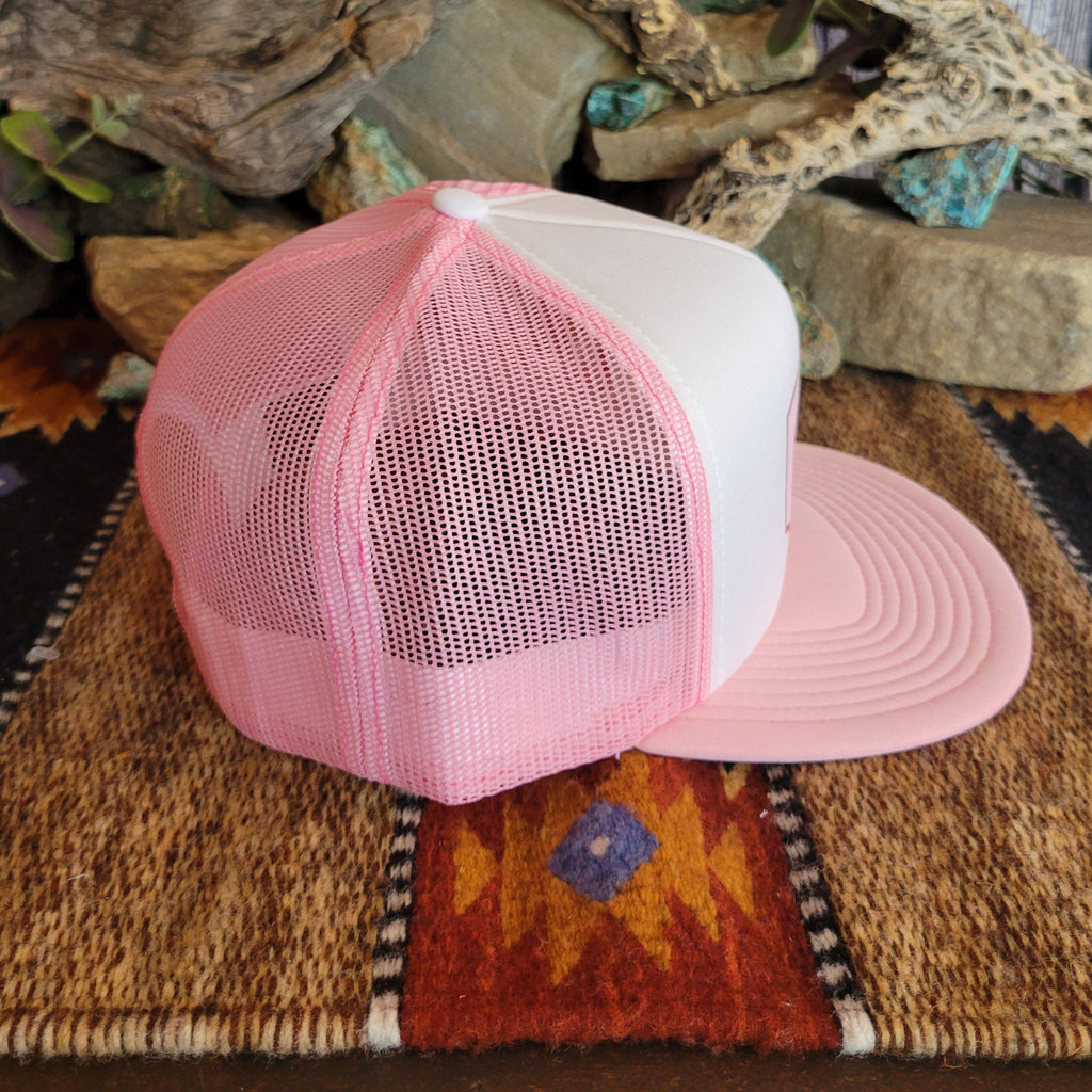 A pink trucker cap with pink mesh paneling.