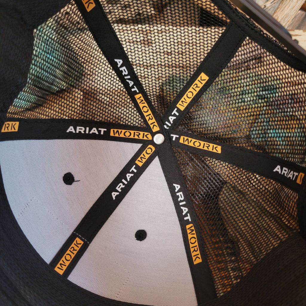 The interior of the cap with Ariat logo designs.