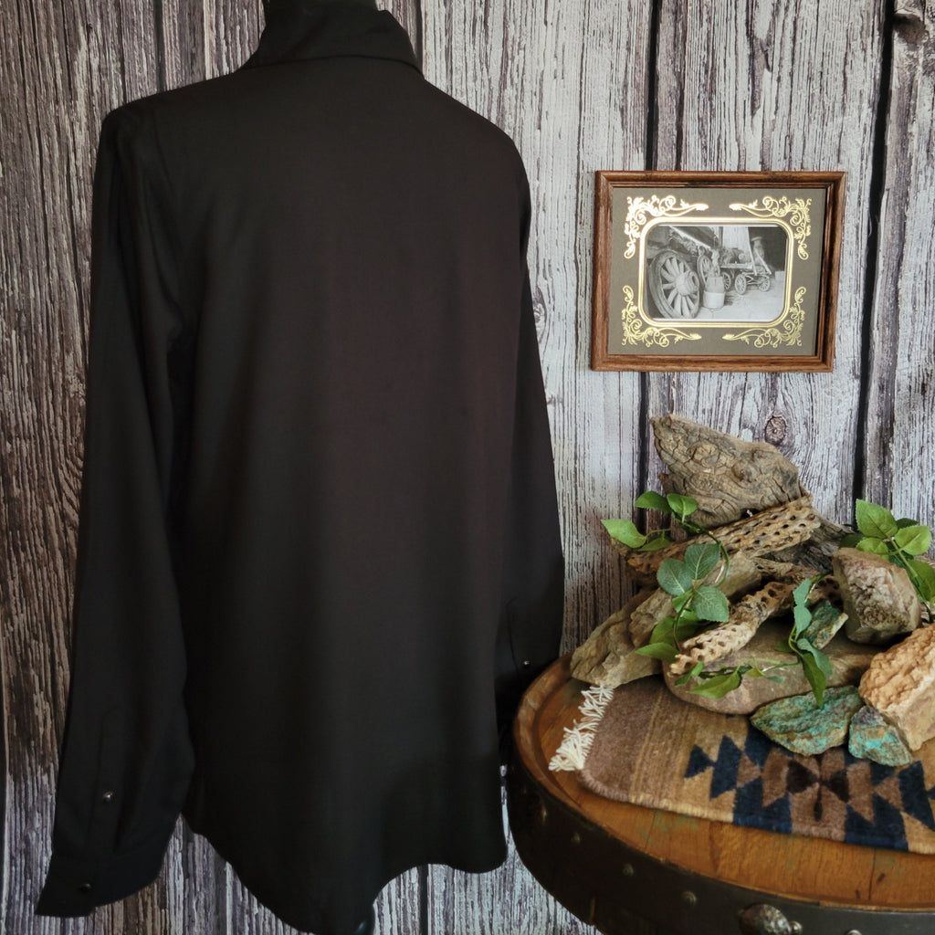 The back of the shirt is plain black.