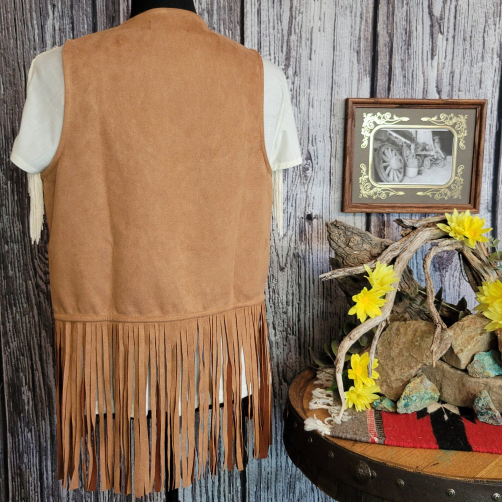 Plain brown on the back with fringe on the bottom.