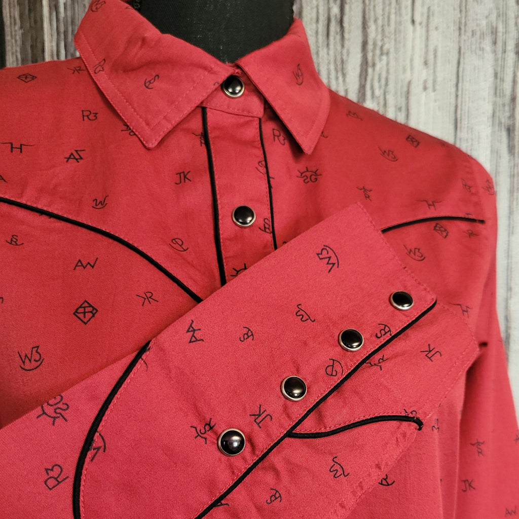 A close-up of the cattle brand print on the sleeve.